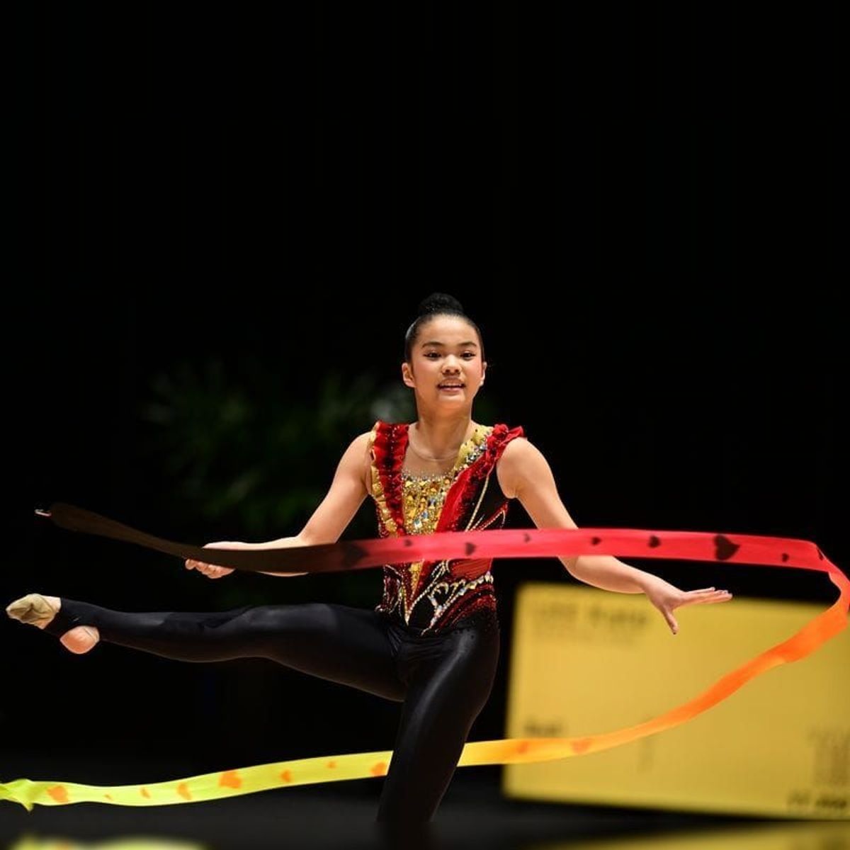 Rhythmic gymnast performing with a ribbon